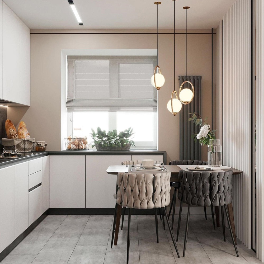 A Small Kitchen With A Dining Table 13