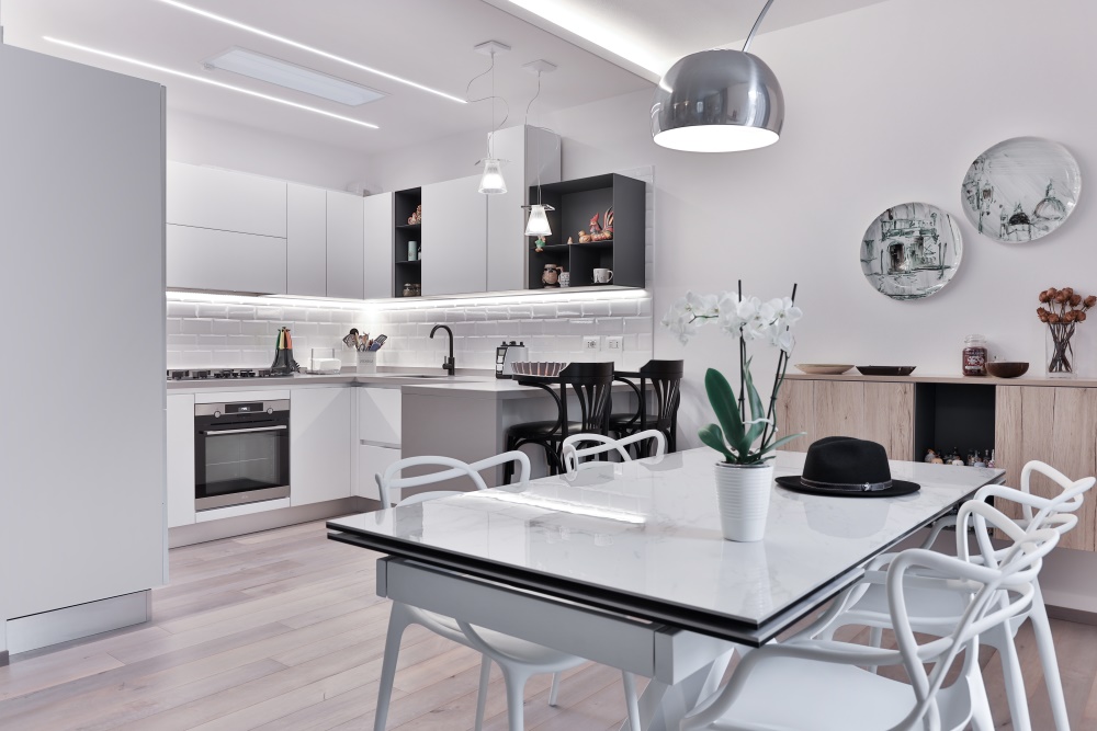 A Small Kitchen With A Dining Table 2